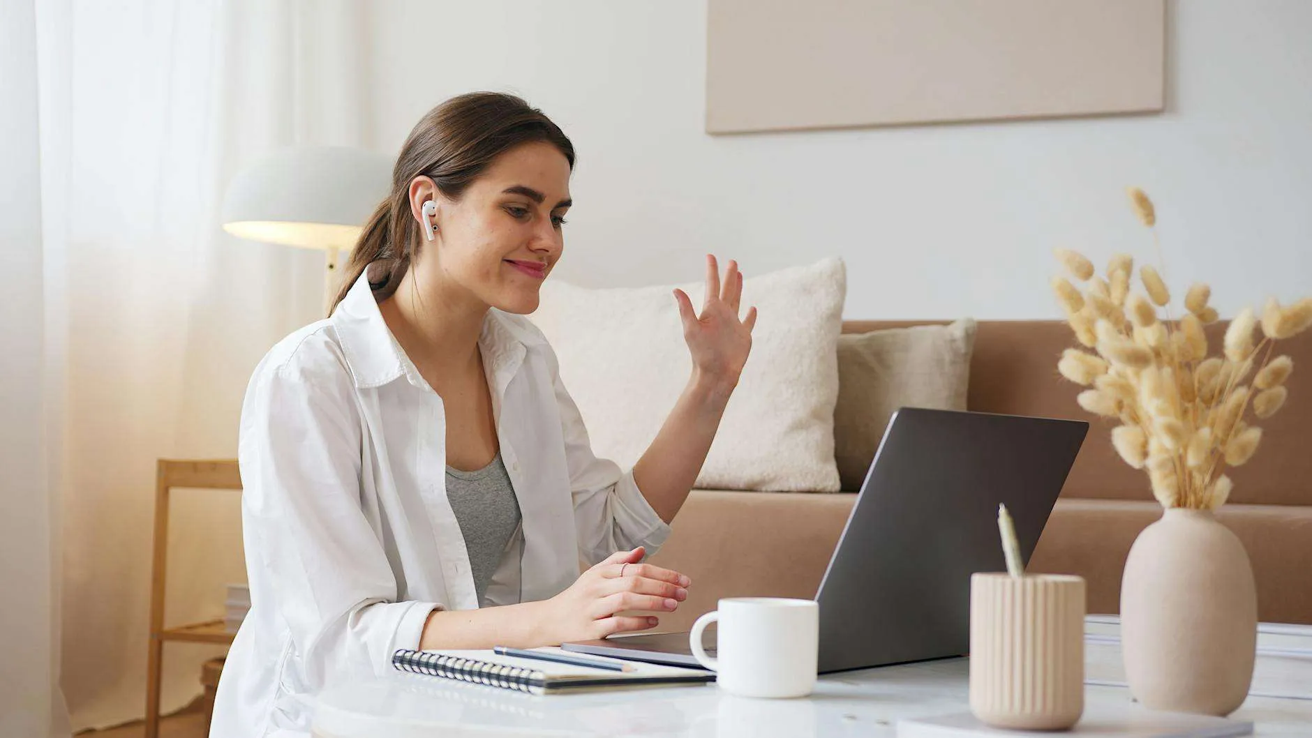 Person attending a virtual therapy session from home